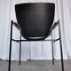 Fauteuil lounge vintage Niko Kralj : cuir skaï noir et accoudoirs en bois