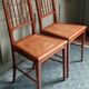 Pair of caned mahogany chairs, circa 1930.