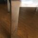 Pouf métal et cuir noir