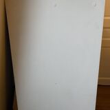 Beige wooden bookshelf