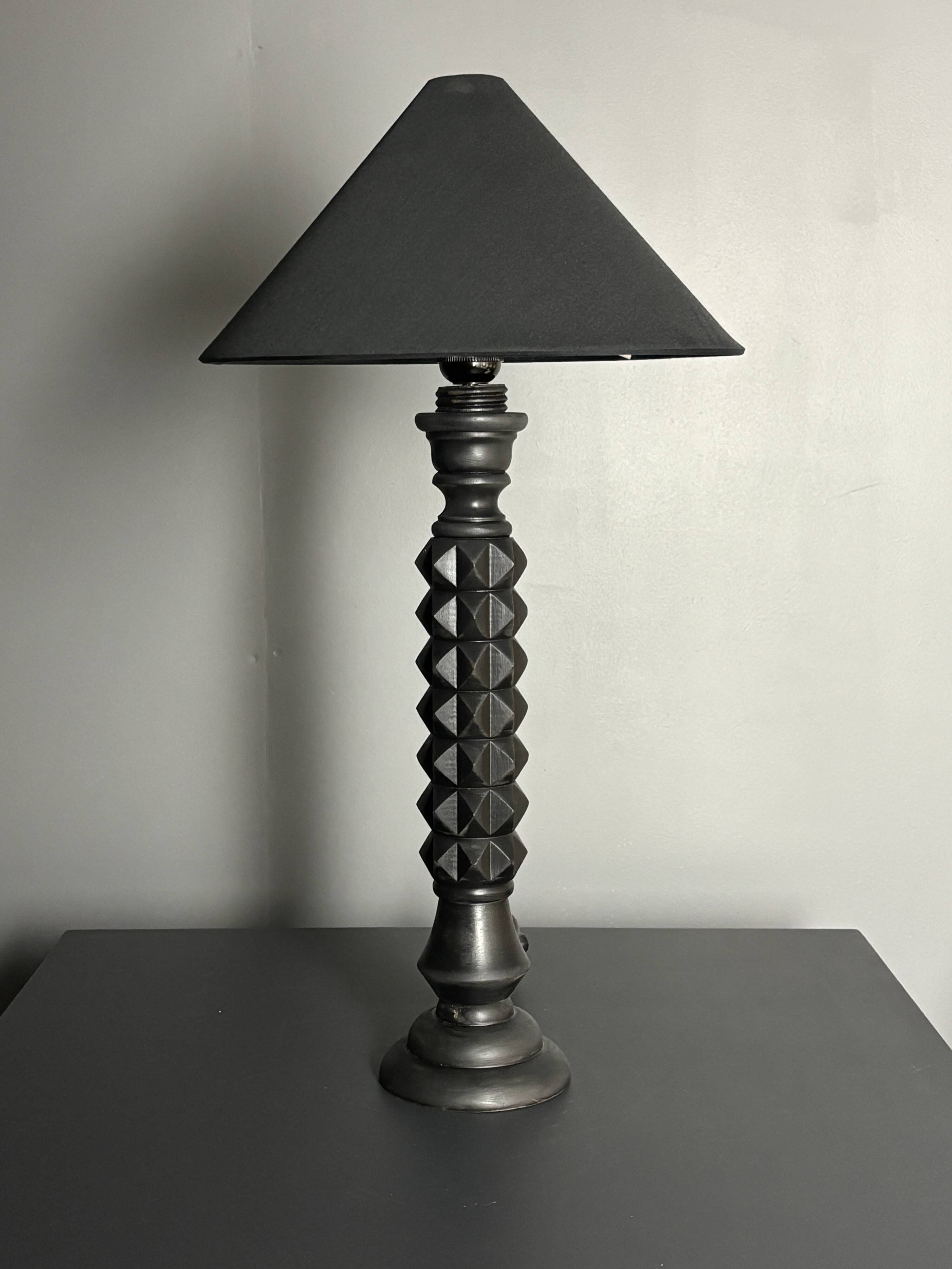 Brutalist wood turned ebonized table lamp in the style of Charles Dudouyt