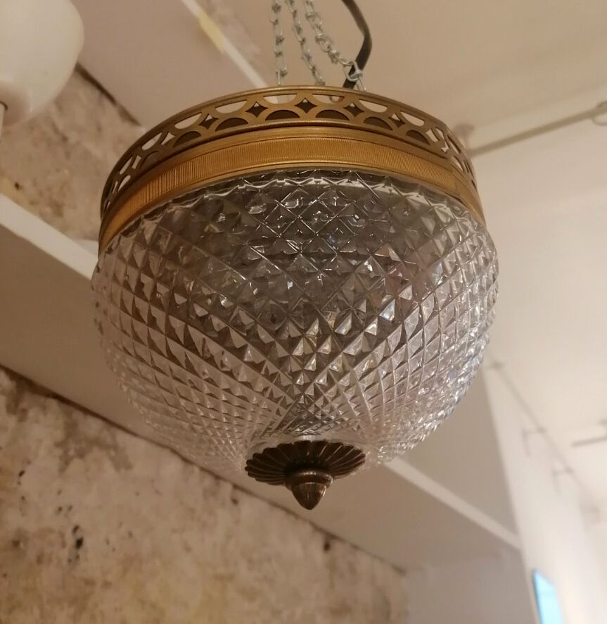 Pair of faceted glass ceiling lights and brass strapping, 1950.