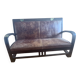 Vintage colonial-style bench in solid wood and patinated leather.