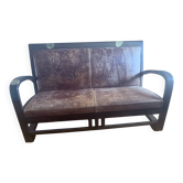 Vintage colonial-style bench in solid wood and patinated leather.