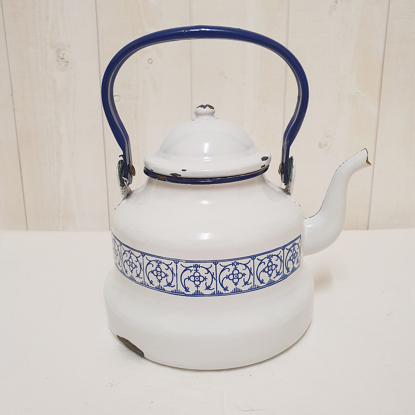 White and blue enamelled kettle