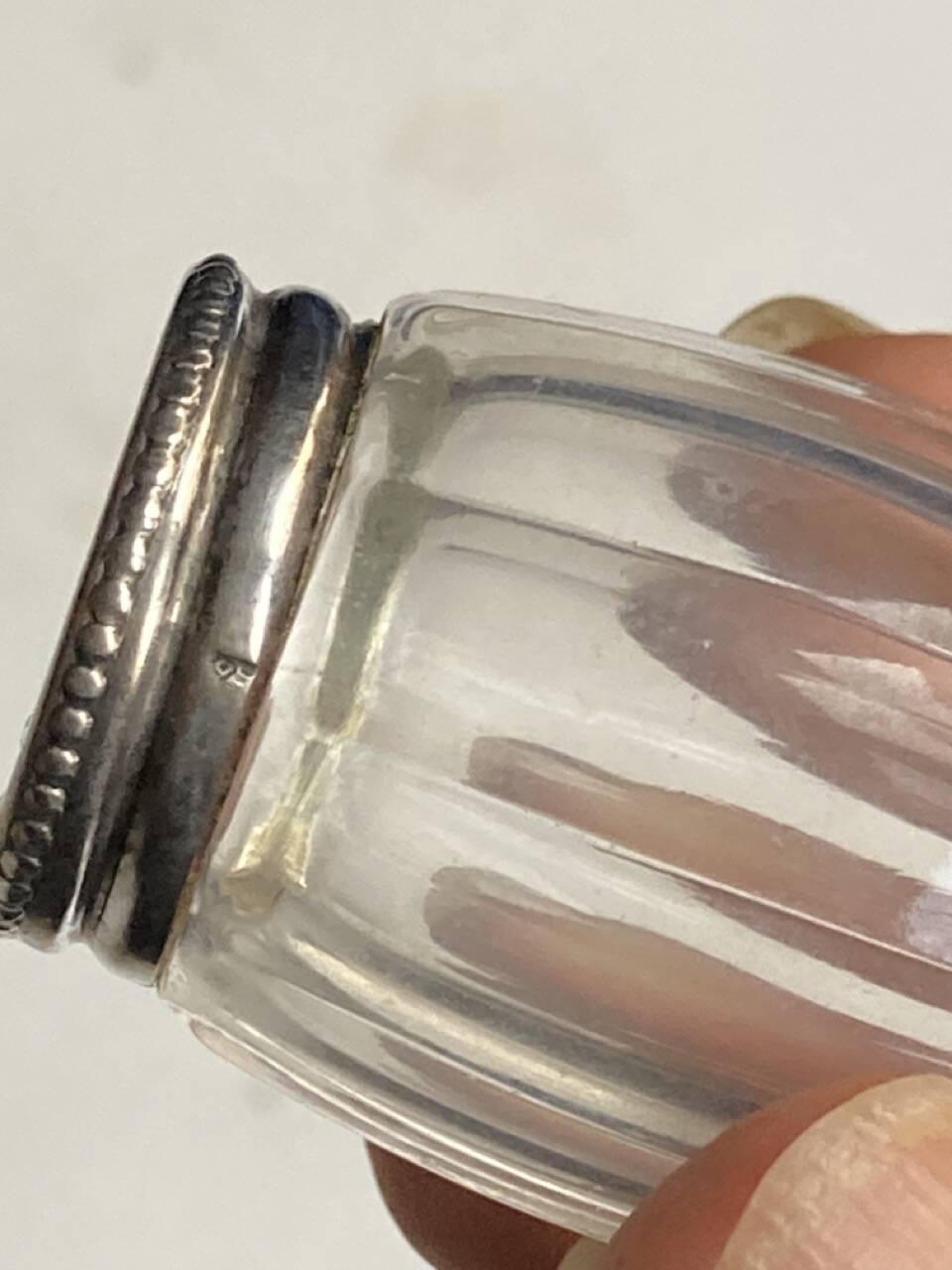 Set of hallmarked silver and fluted domed glass salt/pepper shakers