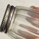 Set of hallmarked silver and fluted domed glass salt/pepper shakers