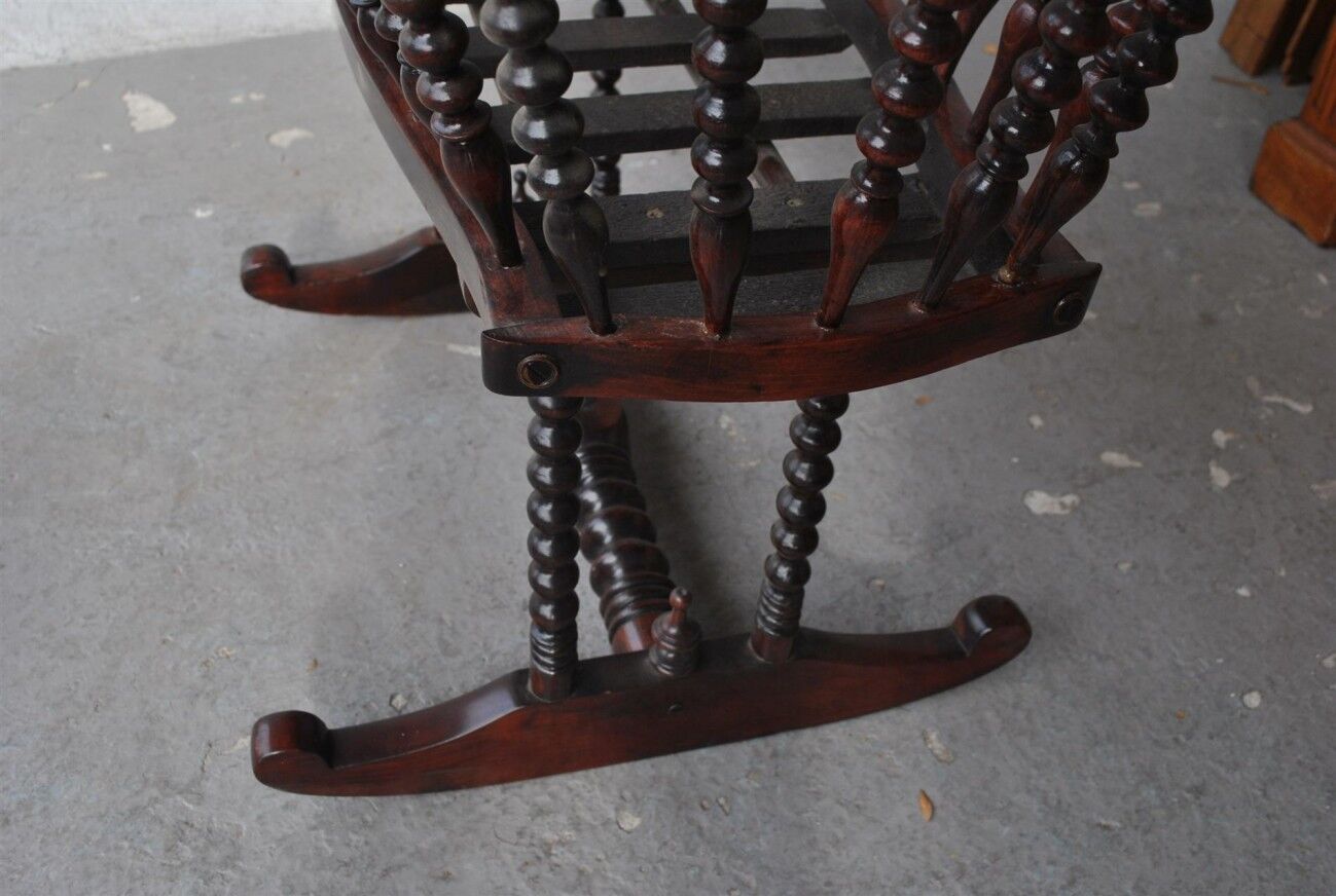 Old mahogany tinted exotic wooden cradle