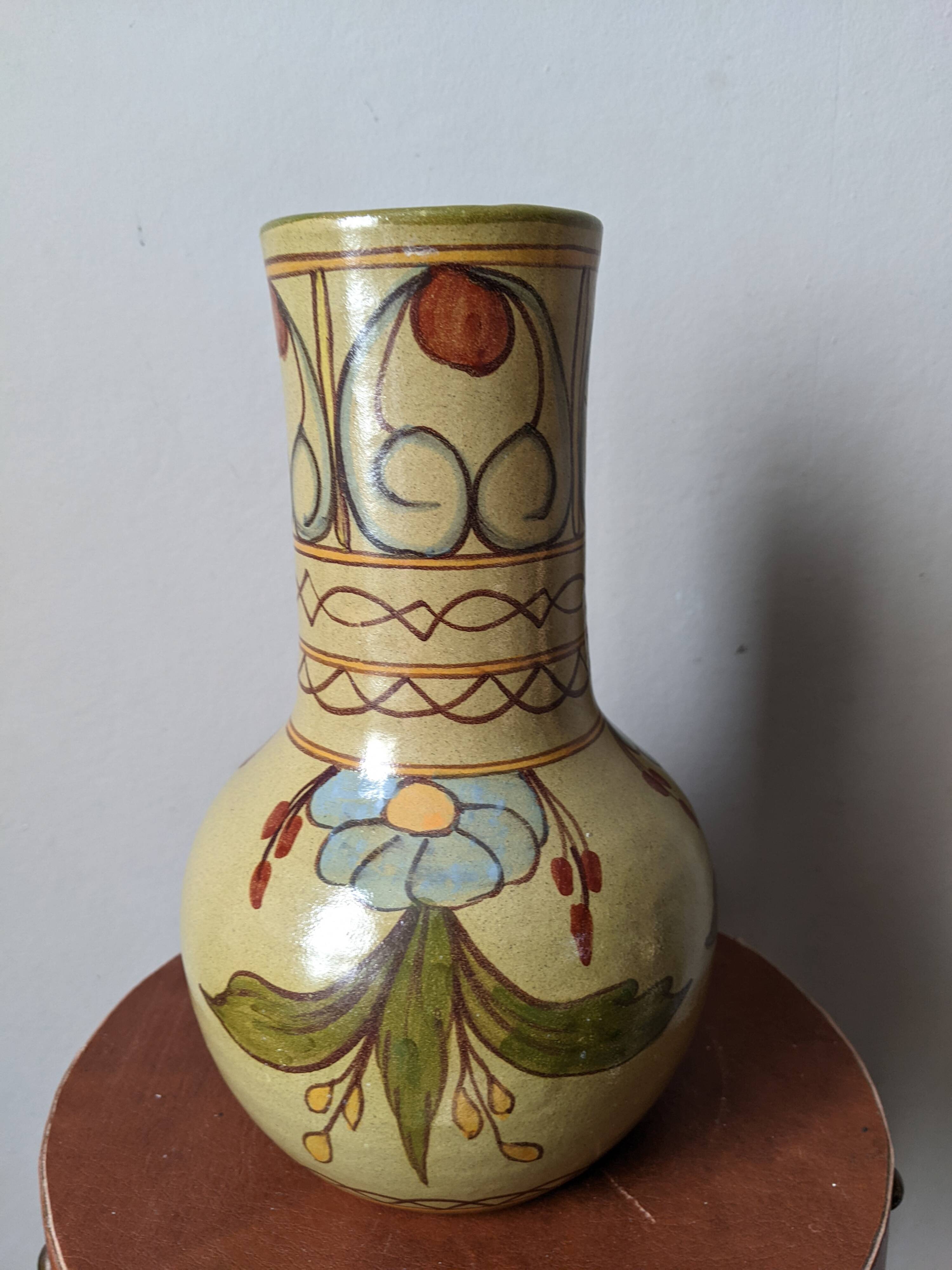 Handcrafted ceramic vase with floral decoration, Portuguese craftsmanship.