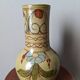 Handcrafted ceramic vase with floral decoration, Portuguese craftsmanship.