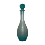 Transparent blue decanter with bubbles