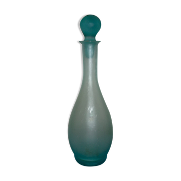 Transparent blue decanter with bubbles