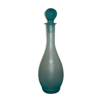 Transparent blue decanter with bubbles