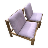 Paire de fauteuils longe en bois massif et cuir, travail européen, ca 1970