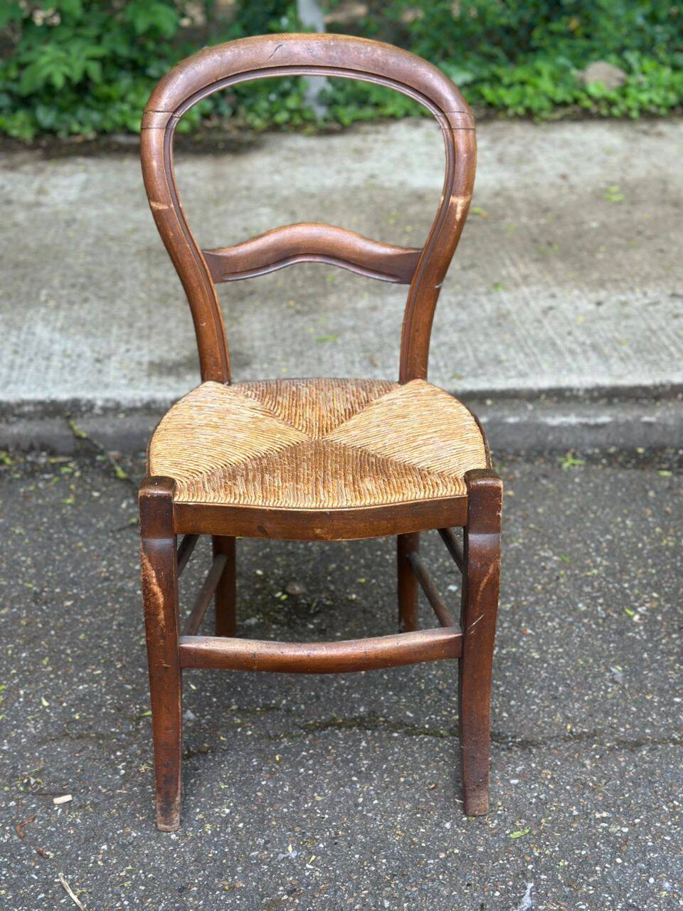 Vintage solid oak chair with rush seat, Louis Philippe style from the 20th century.