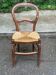 Vintage solid oak chair with rush seat, Louis Philippe style from the 20th century.