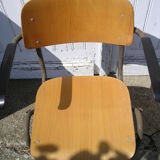 Pair of stackable class armchairs with Bakelite armrests