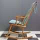 Mid century wooden rocking chair with blue upholstery  1960s