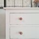 Old white wooden chest of drawers