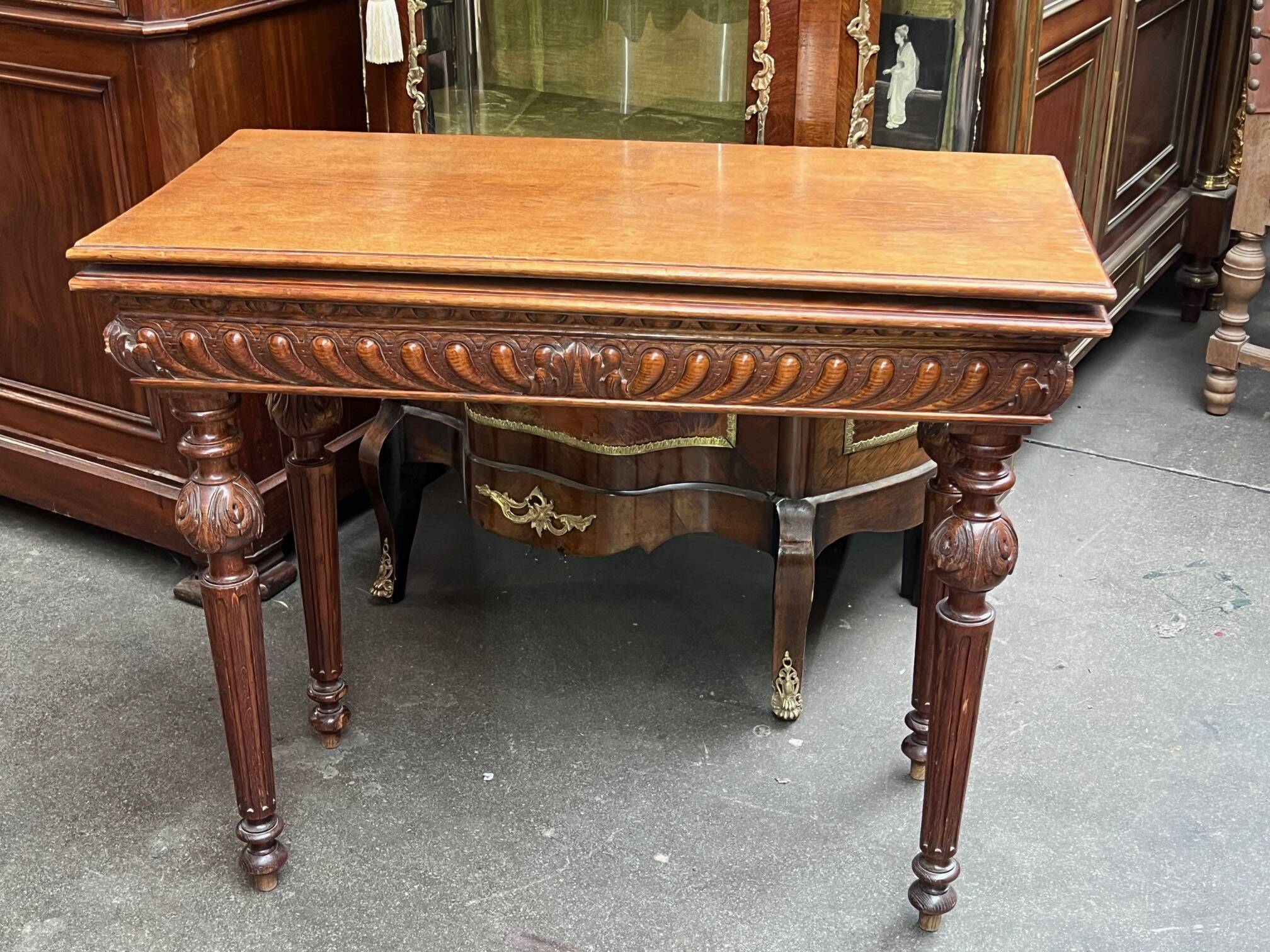 Table in Henri II style game console.