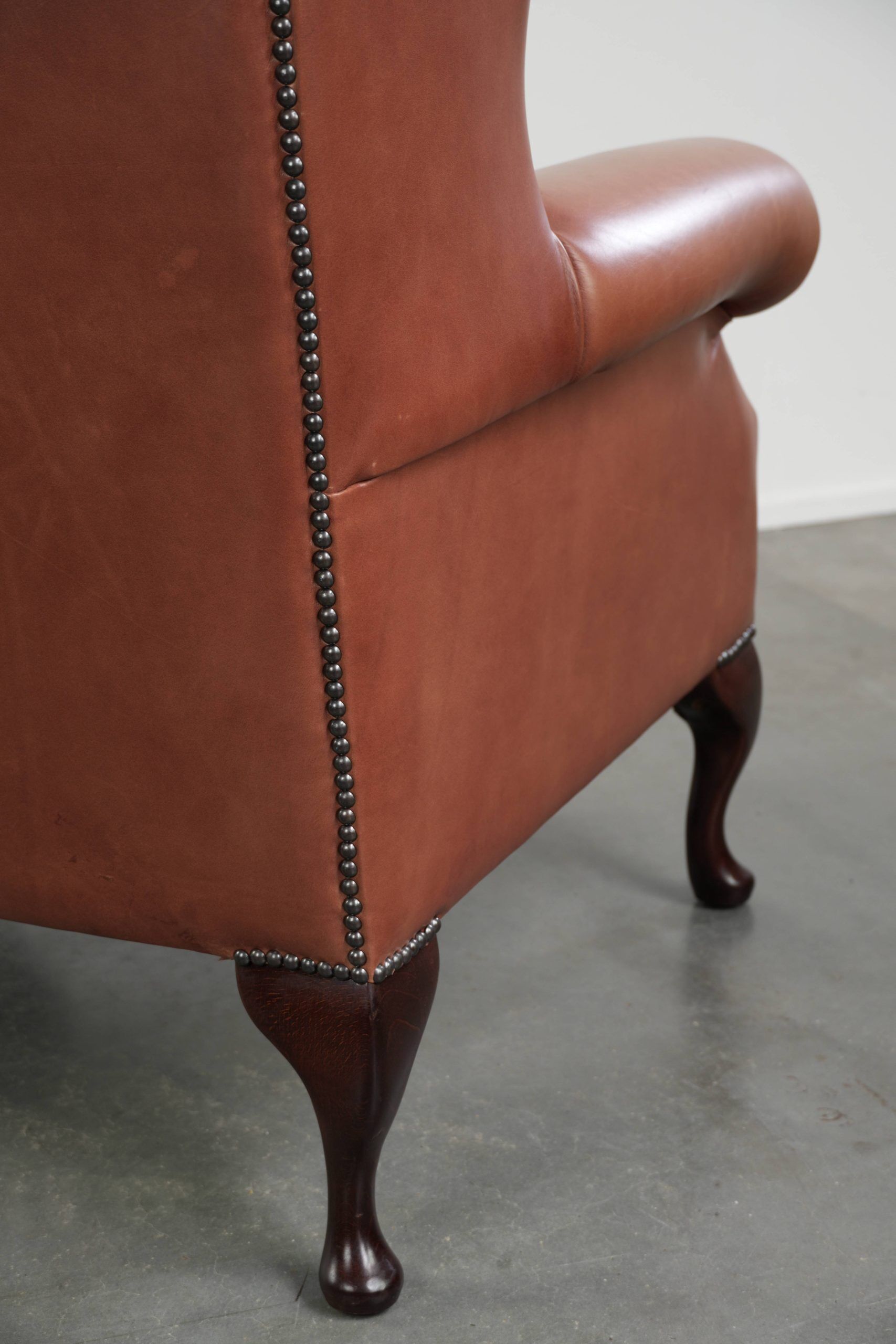 Classic English cowhide button seat chesterfield wingback armchair