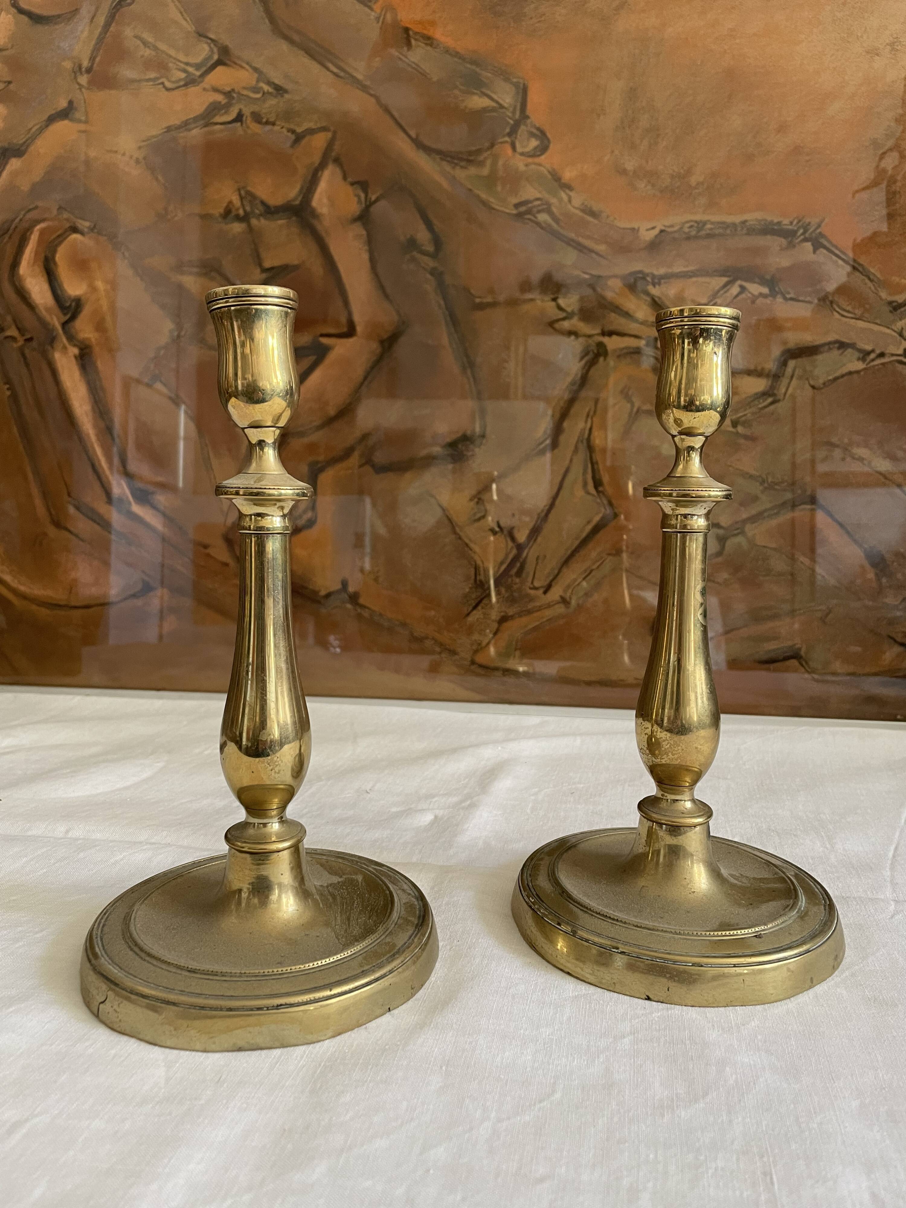 Pair of brass candle holders