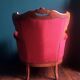 Wooden armchair carved baroque style in burgundy red velvet