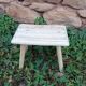 Small stool in raw wood