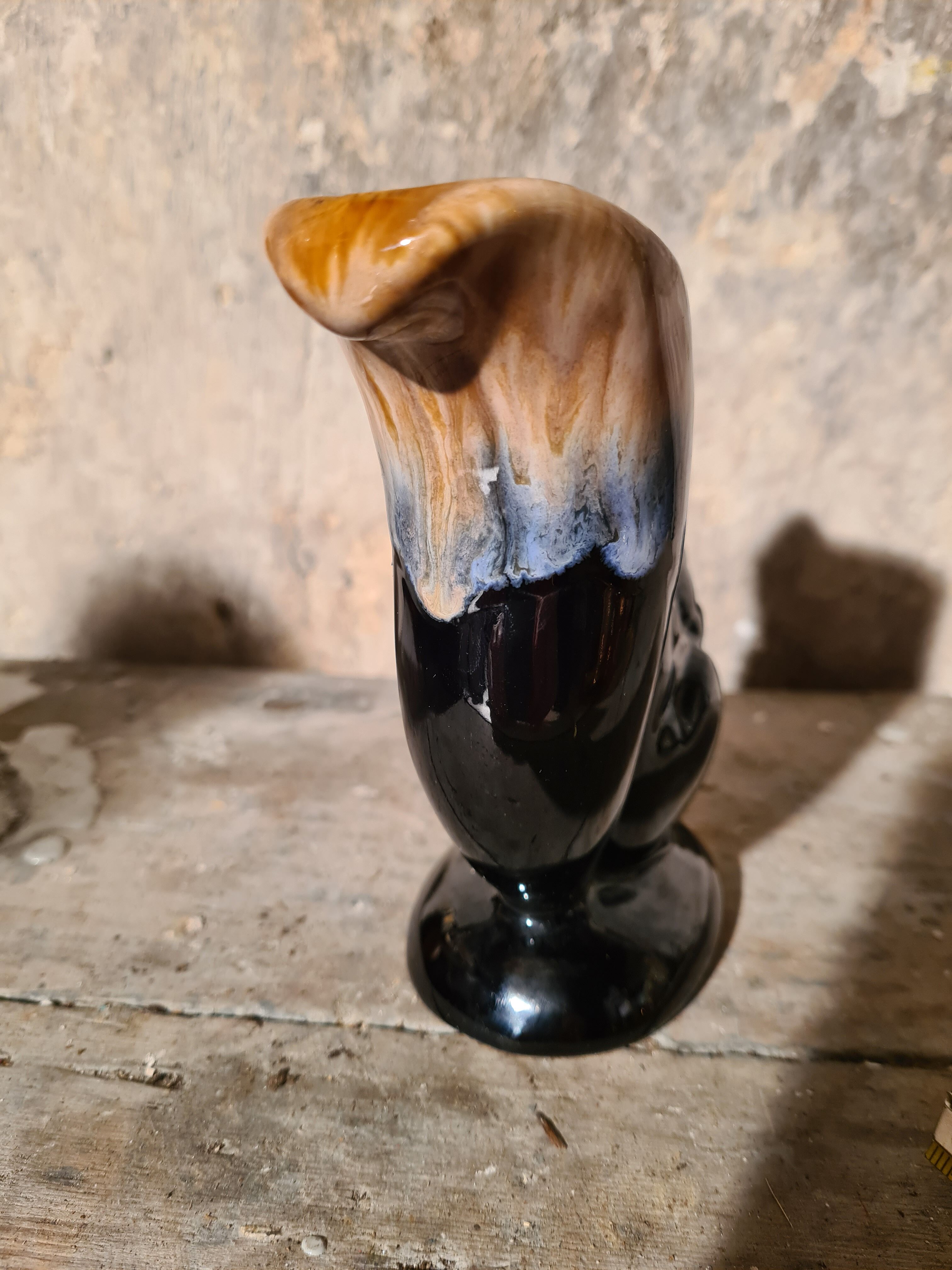 Flaming sandstone squirrel vase