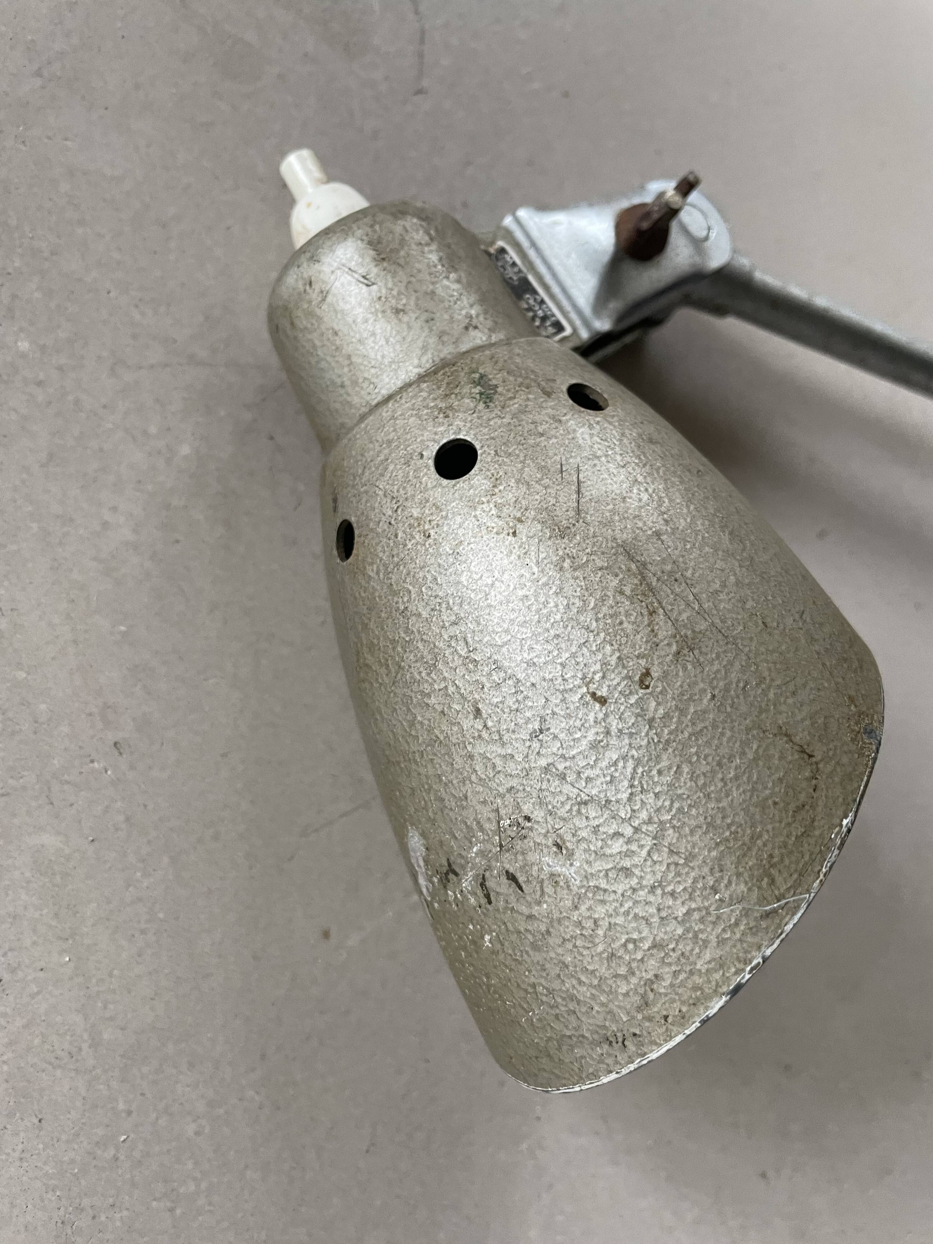 Old industrial articulated lamp