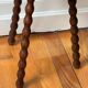 Tabouret tripode en bois tourné