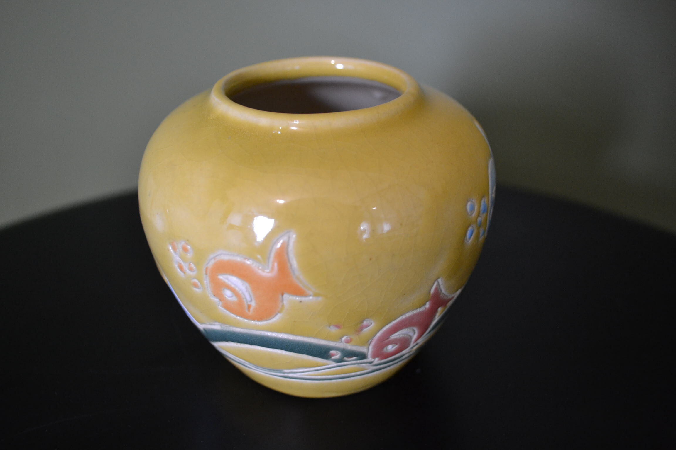 Small yellow fish vase