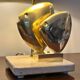 Brass lamp in the shape of a fish by Somchai Hattakitkosol.