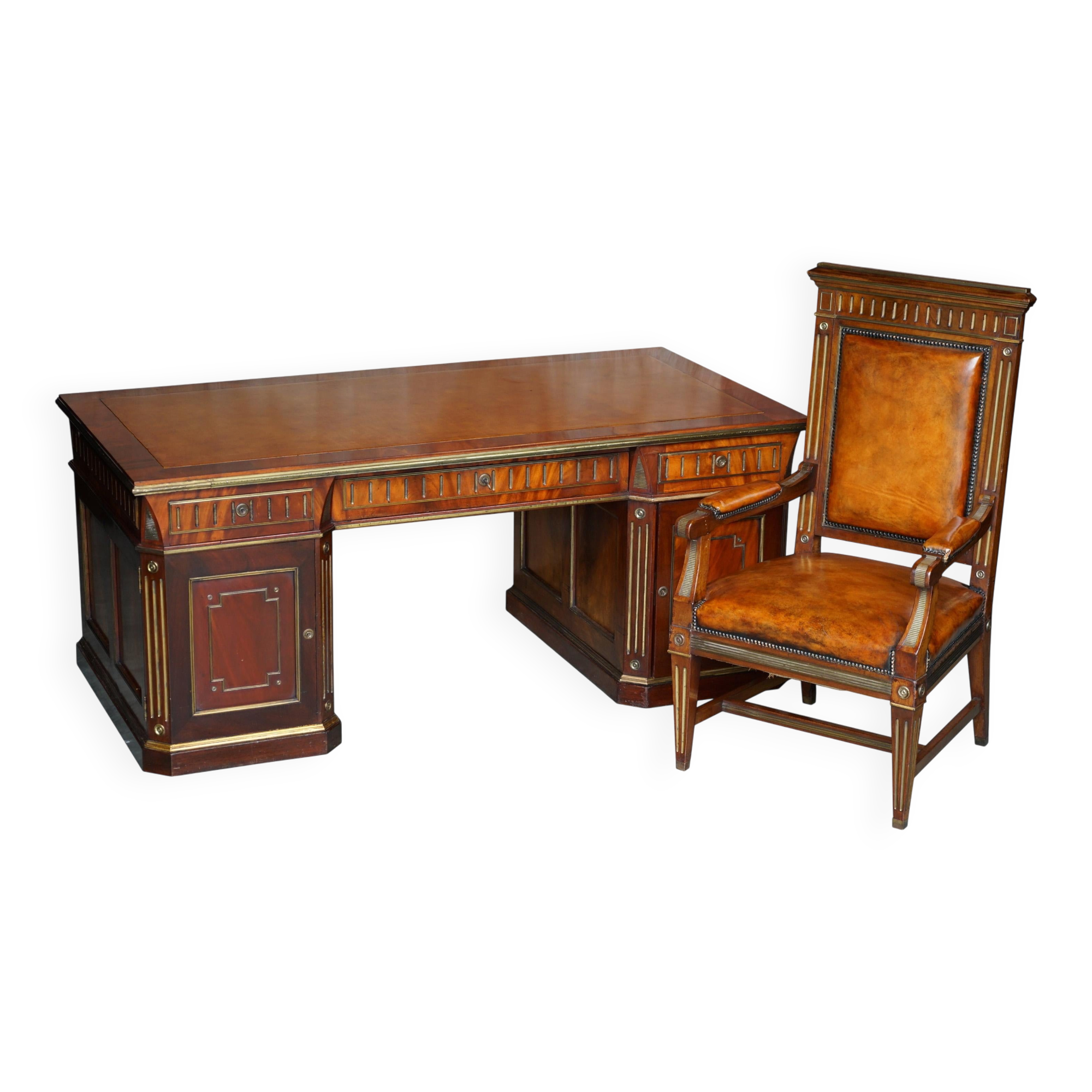 Restored antique Russian hardwood partner desk and leather armchair.