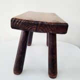 Old small solid wood milking stool