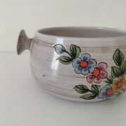 Glazed stoneware dish with floral motif