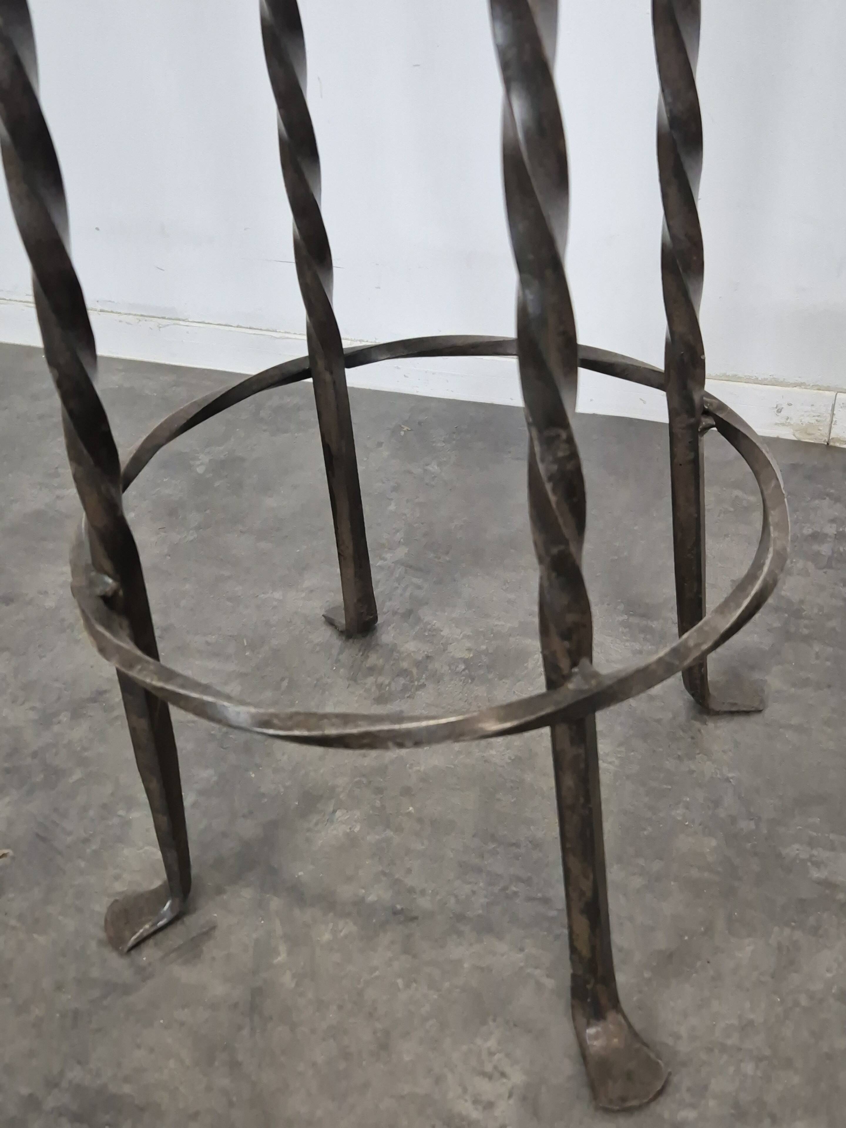 Pair of wrought iron stools