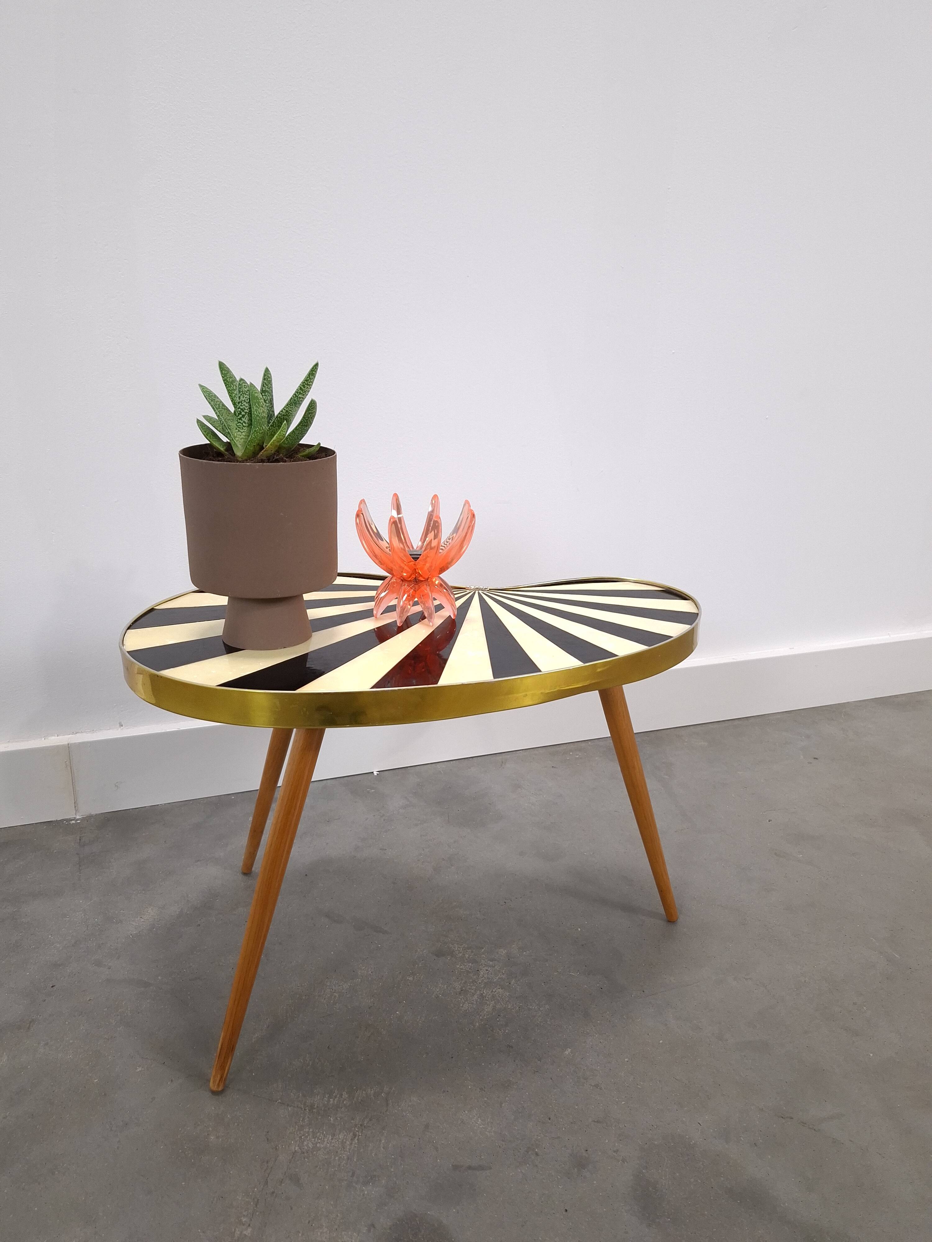 1950s kidney-shaped black and white table, plant table.