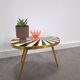 1950s kidney-shaped black and white table, plant table.
