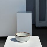 Small white glazed ceramic bowl black edges