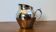 Antique stainless steel milk jug by Remy Letang