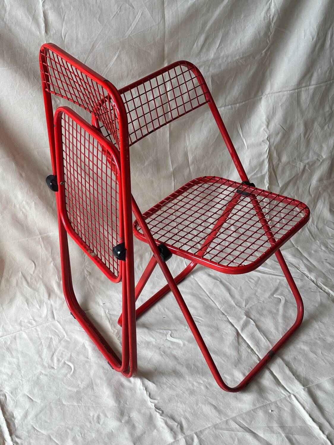 Red folding chairs Talin Italy, 1980