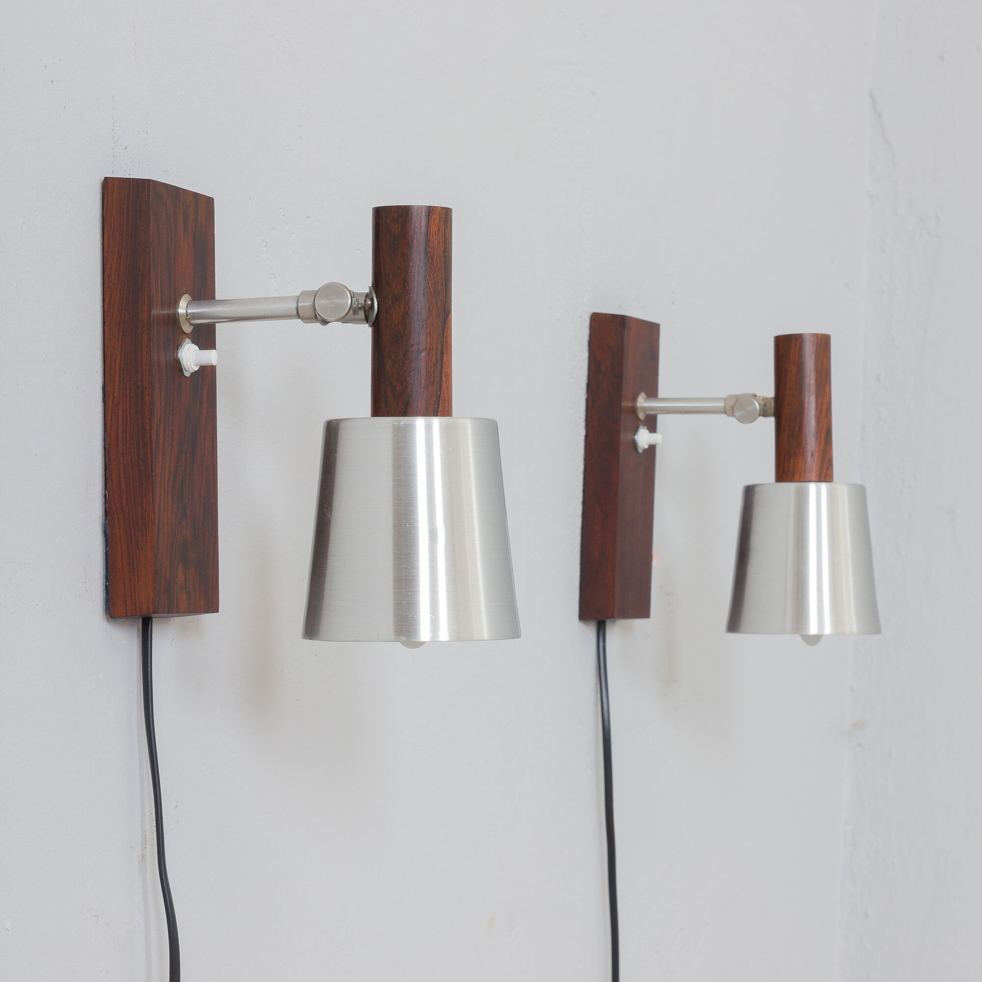 Pair of Jo Hammerborg  rosewood wall sconces with aluminium shades, Denmark 1960s