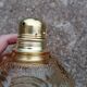 Vintage molded globe pendant lamp in yellow glass