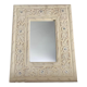 Miroir en bois sculpté
