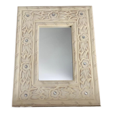 Miroir en bois sculpté