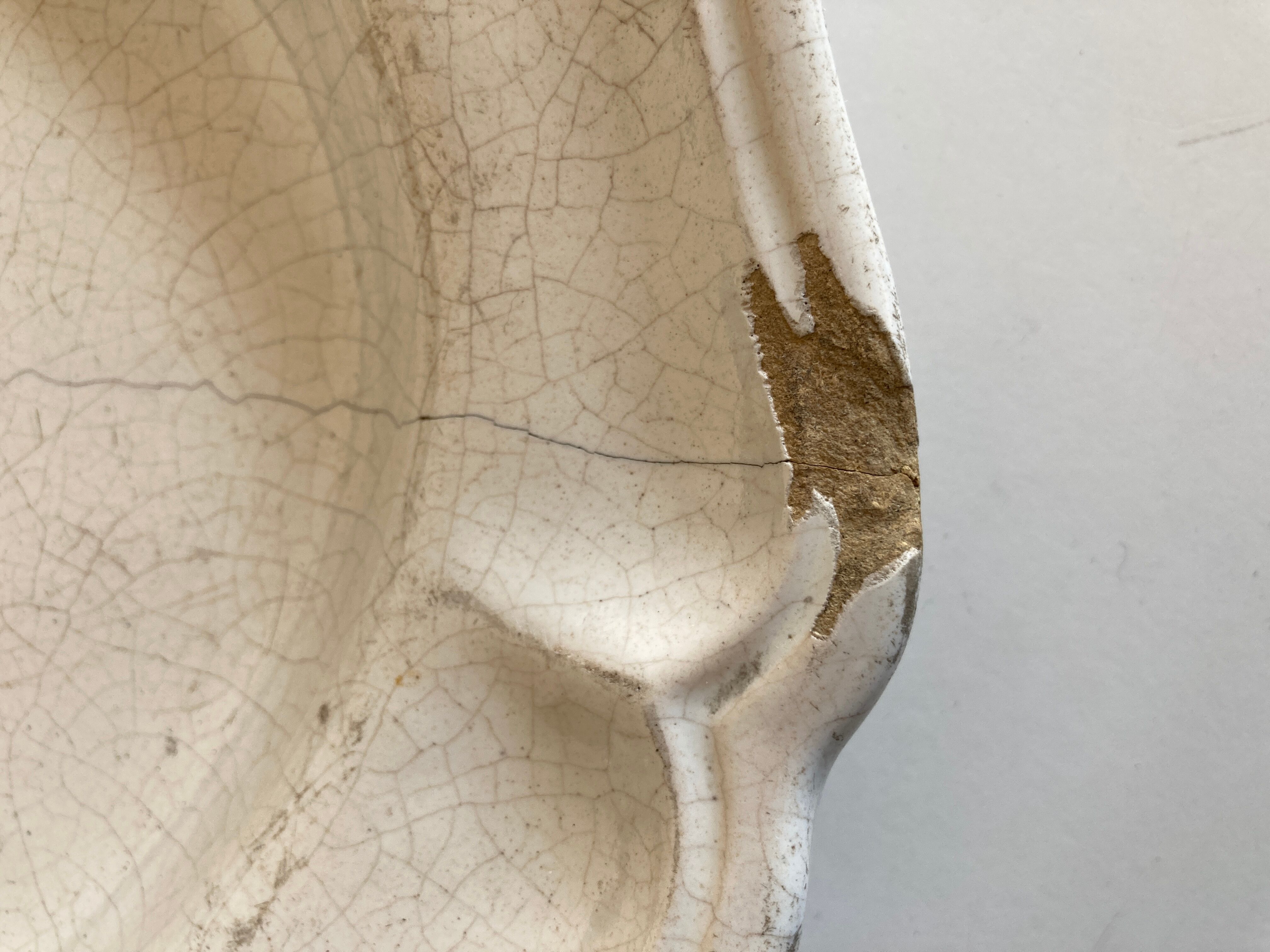 19th-day polished earth dish with godrons