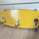 Yellow formica tea towel holder