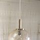 70's amber glass and brass suspension design