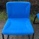 Electric blue fabric designer armchairs with black lacquered metal legs from the 80s.